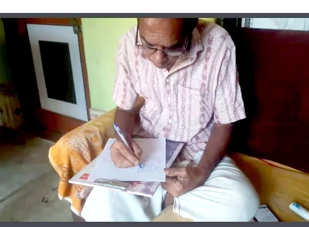 Drawing Bandha on graph paper in the studio